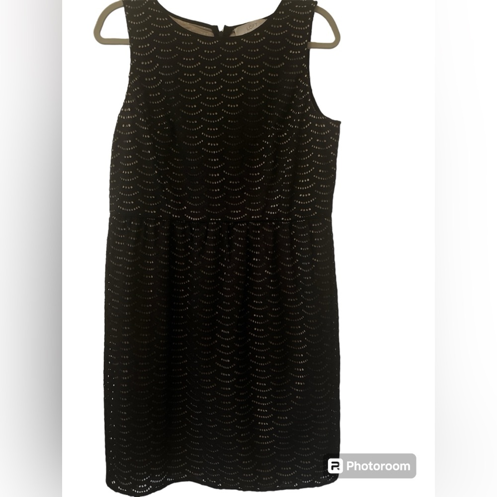 Women’s dress Loft size 12.  Zipper back w hook close.  Black with tan .